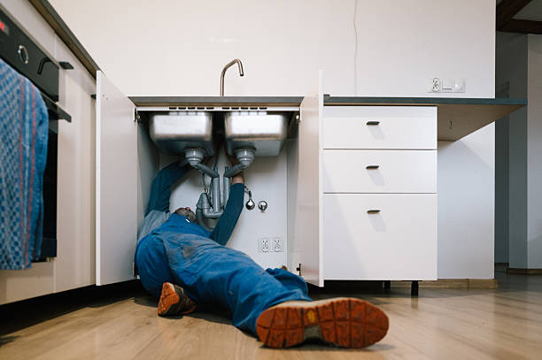 Professional Drain Cleaning technician working in Corning, IA